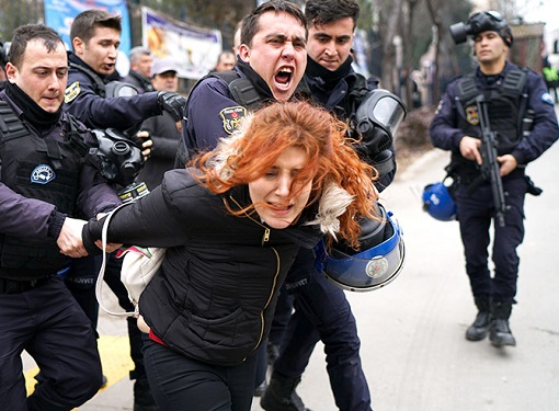Ankara University, Turkey. Police detain a demonstrator protesting against the dismissal of academics following a post-coup emergency decree. � Umit Bektas/Reuters